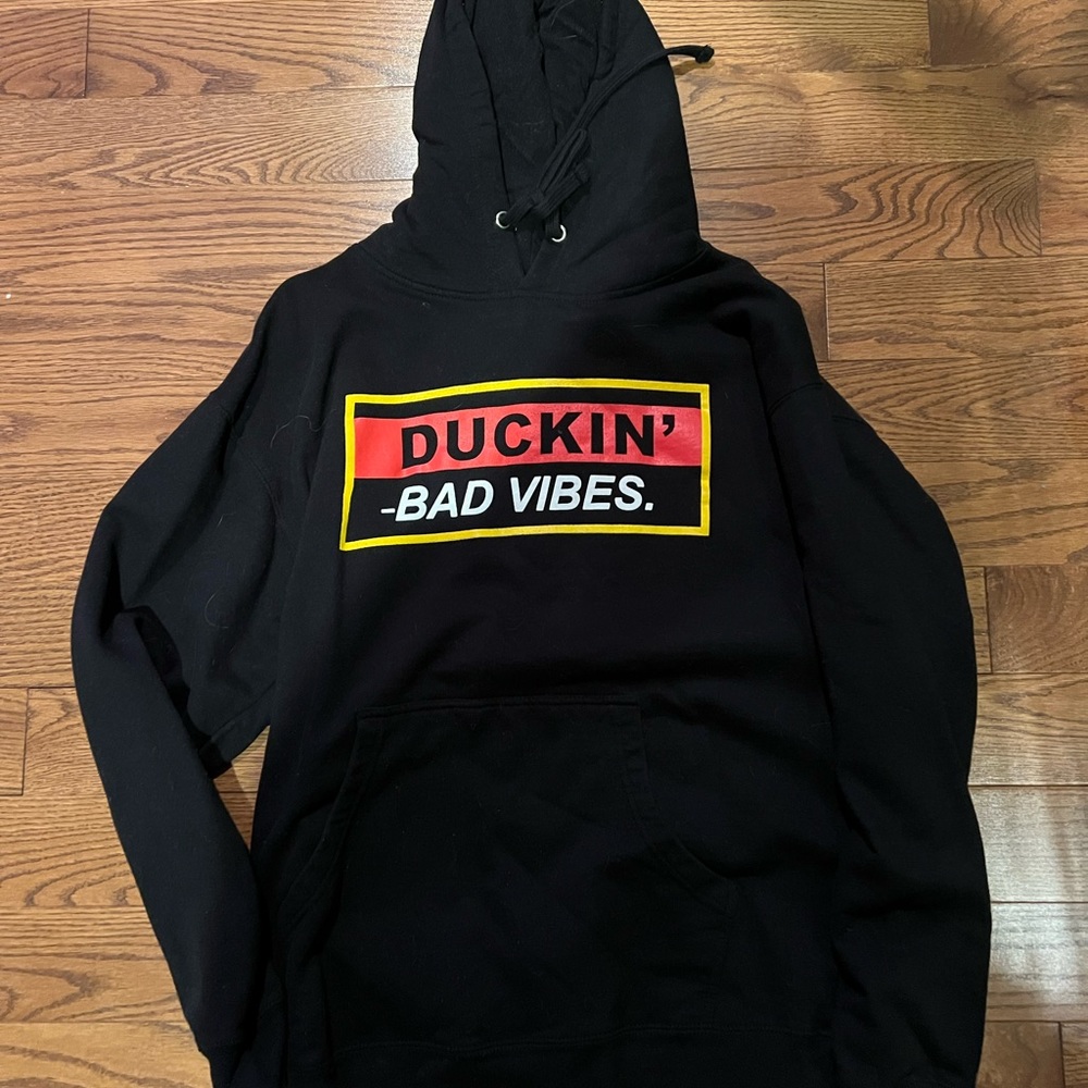 Black hoodie, size Large.